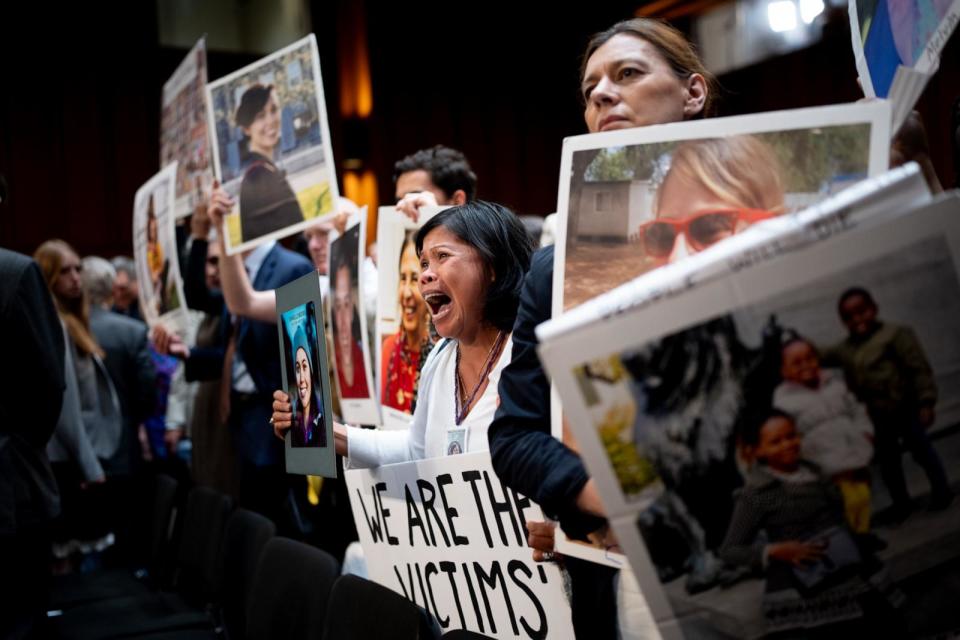 PHOTO: Clariss Moore of Toronto, Canada, holds a photograph of her daughter alongside other families of those killed on Ethiopian Airlines Flight 302 and Lion Air Flight 610 at a Senate subcommittee hearing on Boeing on June 18, 2024, in Washington, D.C. (Andrew Harnik/Getty Images)