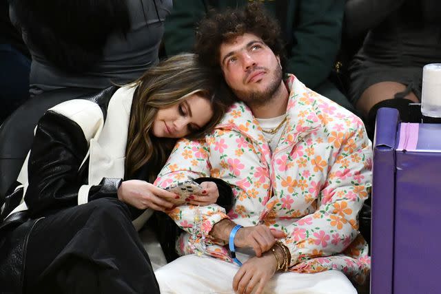 <p>Allen Berezovsky/Getty Images</p> Selena Gomez and Benny Blanco attend a basketball game between the Los Angeles Lakers and the Miami Heat in Los Angeles on Jan. 3, 2024