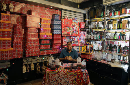 A general view of Mohamed Gamal's shop is seen as he works on making a lantern in Cairo, Egypt May 16, 2017. REUTERS/Mohamed Abd El Ghany