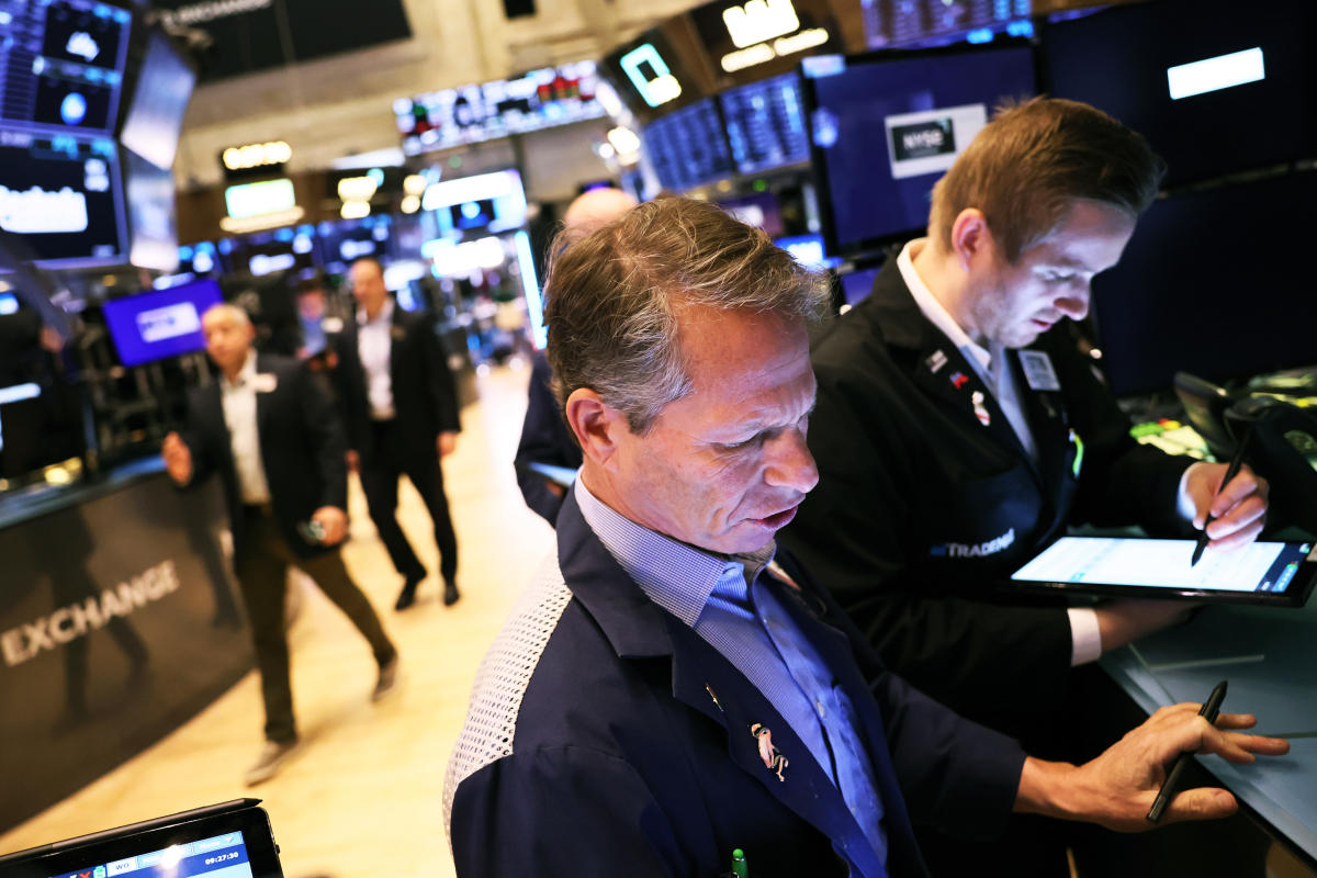 Stocks end Friday with modest gains and weekly losses