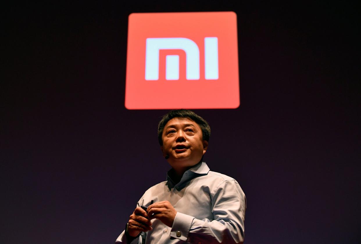 Senior vice president of Xiaomi, Xiang Wang, spoke at a UK launch event in London,on November 8. The company has been criticised for a "click-bait" £1 mobile phone promotion, where only two or three phones were actually sold for the price in a matter of seconds: Reuters/Toby Melville