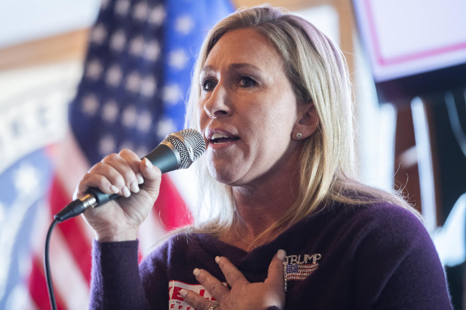 Marjorie Taylor Greene, Republican nominee for Georgia's 14th Congressional District, speaks during a campaign event with Sen. Kelly Loeffler, R-Ga., who is running for reelection, at J.D.s on the Lake in Canton, Ga., on Saturday, October 31, 2020. (Tom Williams/CQ-Roll Call, Inc via Getty Images)