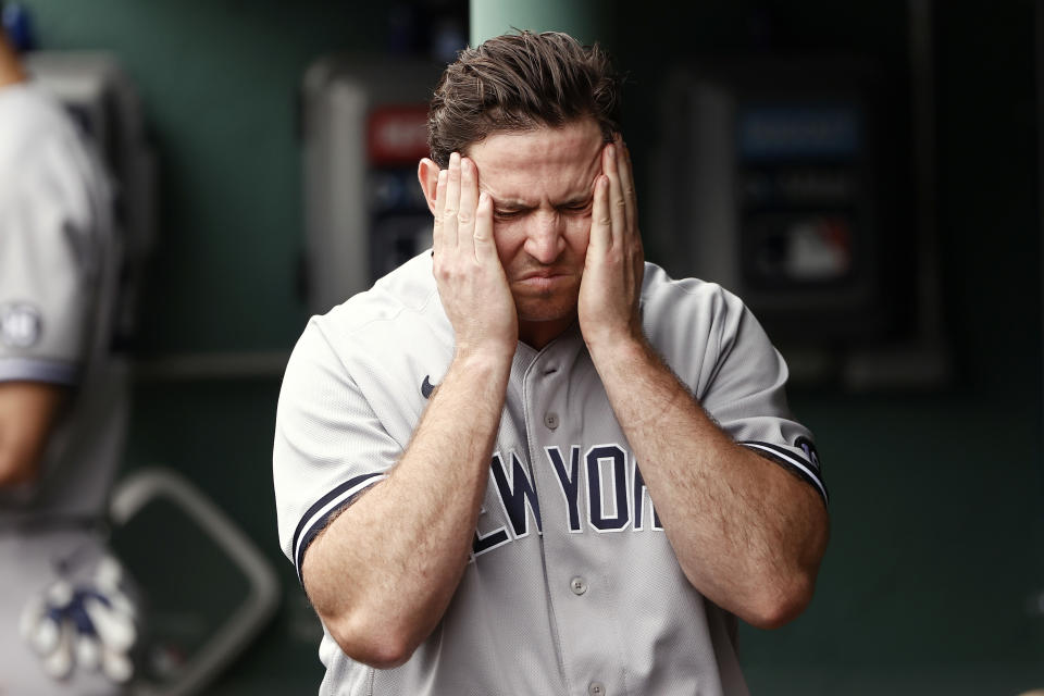 Yankees pitcher Zack Britton reacts in the dugout after giving up the go-ahead sacrifice fly during the eighth inning of their 5-4 loss to the Boston Red Sox on Sunday. (Photo By Winslow Townson/Getty Images)