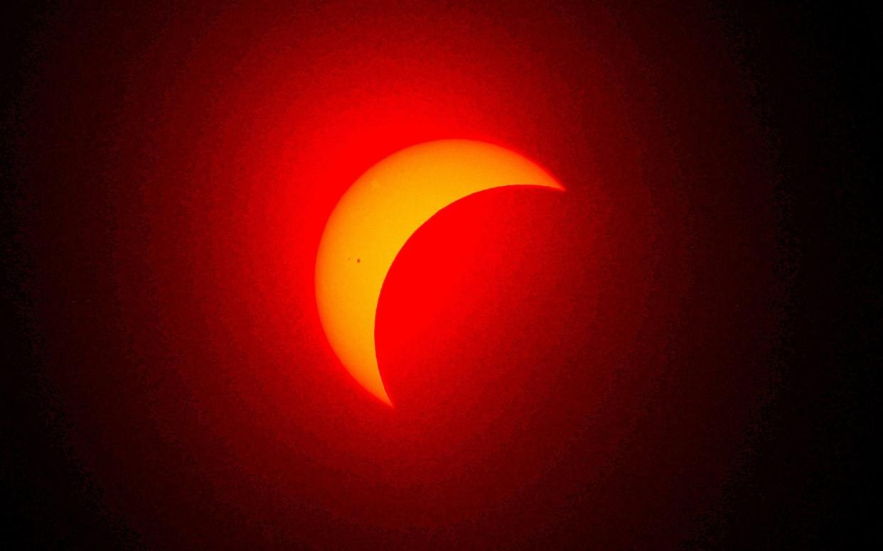 The moon eclipses the sun on April 8, 2024 in Fort Worth, Texas.