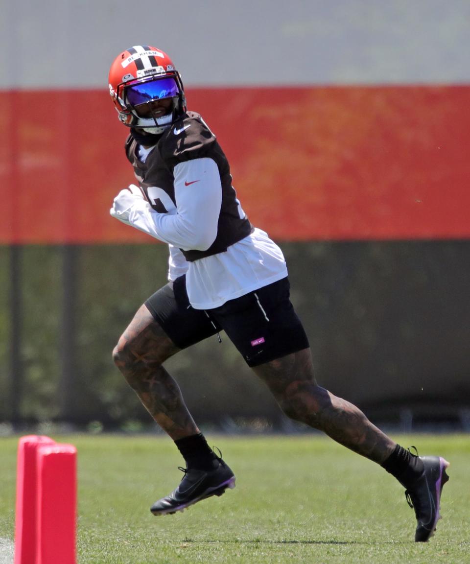 Cleveland Browns wide receiver Odell Beckham Jr. (13) jogs downfield during an NFL football practice at the team's training facility, Wednesday, June 16, 2021, in Berea, Ohio. [Jeff Lange / Akron Beacon Journal]