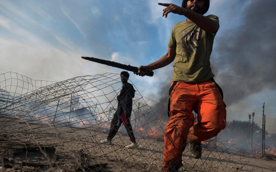 The Jungle, the now-closed camp east of Calais, came to symbolise Europe's refugee crisis - Credit: David Rose