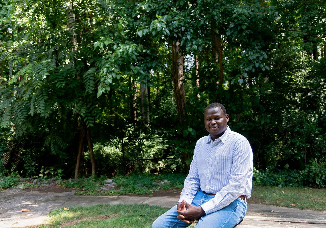 Adam Sadda, photographed on Tuesday, July 4, 2023, in Durham, N.C., was a teenager when he and his family fled genocide in Darfur, Sudan. He arrived in Durham in 2013 and recently graduated from UNC-Greensboro with a bachelor’s degree. Sadda says events like Durham Refugee Day, held this year on Saturday, July 8, are an important way to honor the cultures and contributions of refugees. “These events are very important to go out and celebrate the strength and resiliency of refugees who are coming from different backgrounds.”