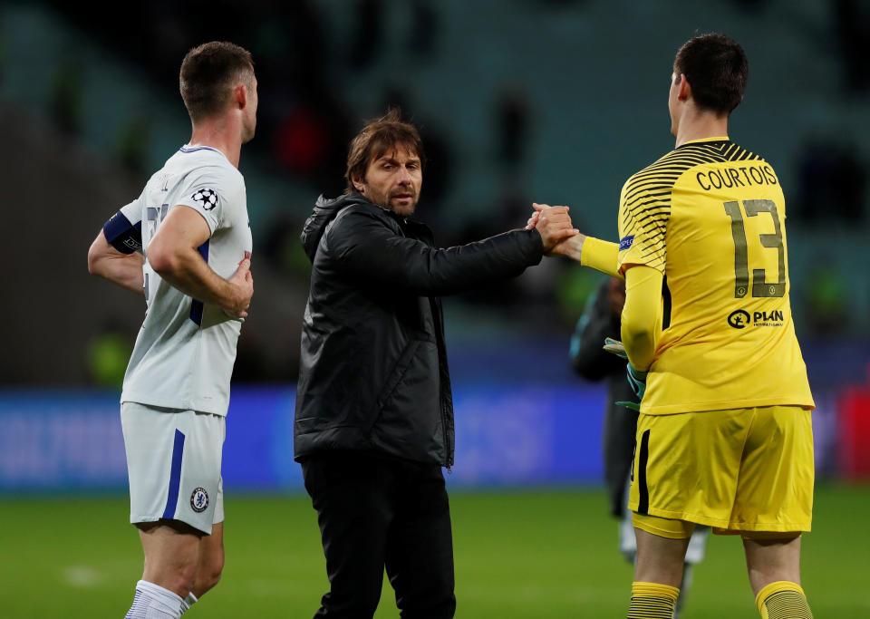 Chelsea manager Antonio Conte celebrates after the match with Thibaut Courtois and Gary Cahill Action Images via Reuters/Peter Cziborra