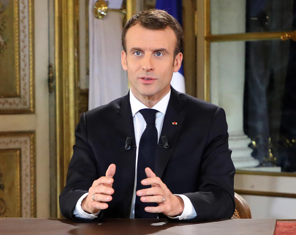 <p> French President Emmanuel Macron poses before a special address to the nation, his first public comments after four weeks of nationwide 'yellow vest' protests, at the Elysee Palace, in Paris, Monday, Dec. 10, 2018. Facing exceptional protests, French President Emmanuel Macron is promising to speed up tax relief for struggling workers and to scrap a tax hike for retirees. (Ludovic Marin/Pool Photo via AP) </p>