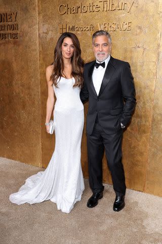 <p> Cindy Ord/Getty Images</p> Amal Clooney and George Clooney