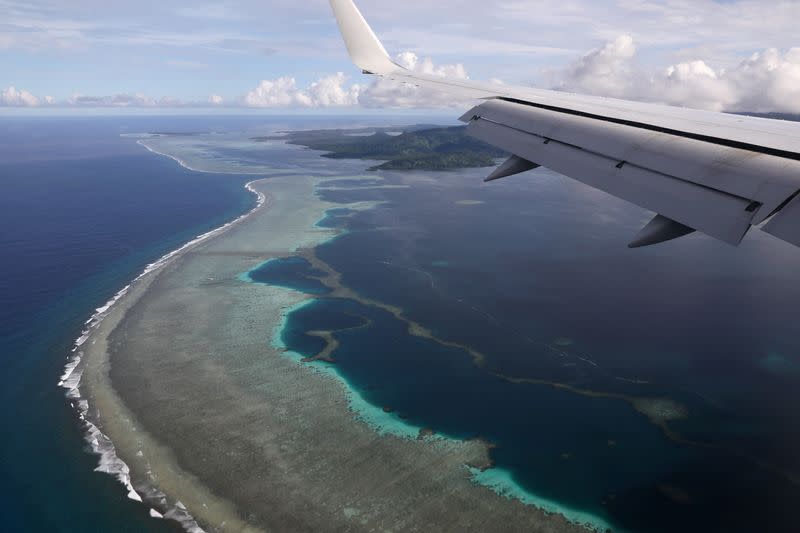 FILE PHOTO: Then U.S. Secretary of State Pompeo's plane makes its landing approach on Pohnpei International Airport in Kolonia, Federated States of Micronesia