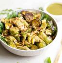 <p>You may not think of “salad” when you consider Thanksgiving dinner, but it’s a good way to get in greens. This Brussels sprouts salad from <a href="https://www.wholesomelicious.com/roasted-brussels-sprouts-salad-with-mustard-basil-vinaigrette/" rel="nofollow noopener" target="_blank" data-ylk="slk:Wholesomelicious;elm:context_link;itc:0;sec:content-canvas" class="link ">Wholesomelicious </a>is perfect, as it has crunch from almonds and a spicy kick from the Dijon mustard, and it’s still low-carb.</p>