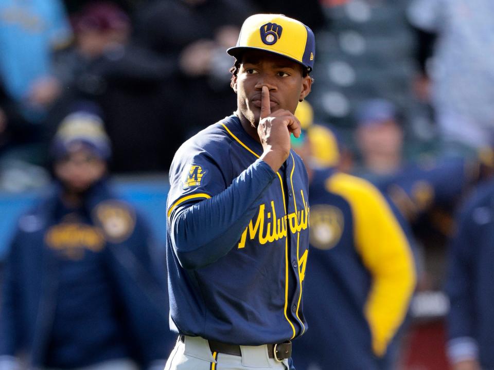 Abner Uribe celebrates locking down a save March 30 when the Brewers defeated the Mets at Citi Field, 7-6.