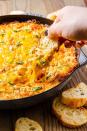 <p>In need for a simple dip that will be a huge hit at any party? This is just the dip. A cheesy crab dip that will be gone in a matter of seconds. Serve with plenty of toasted bread! </p><p>Get the <a href="https://www.delish.com/uk/cooking/recipes/a30283219/easy-hot-crab-dip-recipe/" rel="nofollow noopener" target="_blank" data-ylk="slk:Hot Crab Dip;elm:context_link;itc:0;sec:content-canvas" class="link ">Hot Crab Dip</a> recipe.</p>