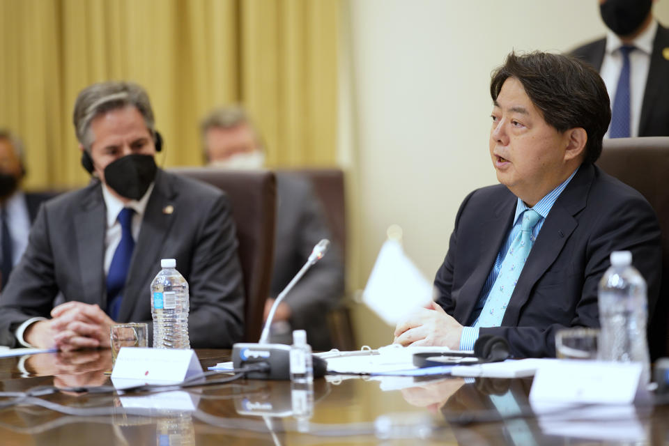 FILE - Japanese Foreign Minister Yoshimasa Hayashi, right, makes opening remarks as United States' Secretary of State Antony Blinken, left, listens during a meeting of the Quad foreign ministers in Melbourne, Australia, on Feb. 11, 2022. Hayashi says he spoke with his U.S. counterpart, Secretary of State Blinken, on the phone Saturday, Feb. 26, and agreed they must respond to Russian invasion of Ukraine properly to prevent it from becoming “a wrong lesson” because of its potential influence in Asia and the Indo-Pacific region. (Sandra Sanders/Pool Photo via AP, File)