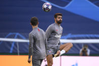 Atletico Madrid's Diego Costa, right, kicks the ball during a training session at the Jose Alvalade stadium in Lisbon, Wednesday Aug. 12, 2020. Atletico Madrid will play Leipzig in a Champions League quarterfinals soccer match on Thursday. (Lluis Gene/Pool via AP)