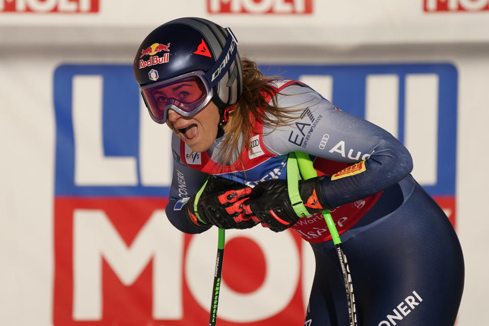 Italy's Sofia Goggia reacts after completing an alpine ski, women's World Cup Super G race, in Val d'Isere, France, Sunday, Dec. 17, 2023. (AP Photo/Giovanni Auletta)