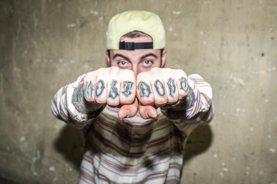 Mac Miller poses during photo session backstage at Casino de Paris on May 30, 2012 in Paris, France.