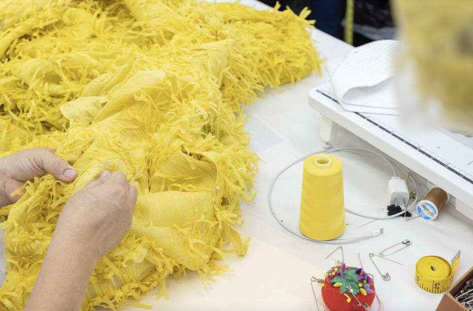 Hand-sewn details of a demi-couture dress