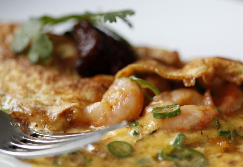 Cracking stuff: Prawn omelette with green chilli, spring onion, coriander and smoked chilli