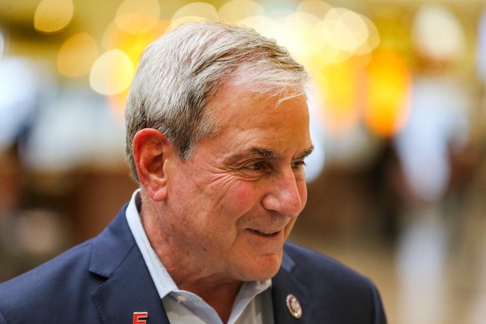 Kentucky Congressman John Yarmuth stops to speak with the media as he arrives on Oct. 13, 2021 at Muhammad Ali Louisville International Airport.