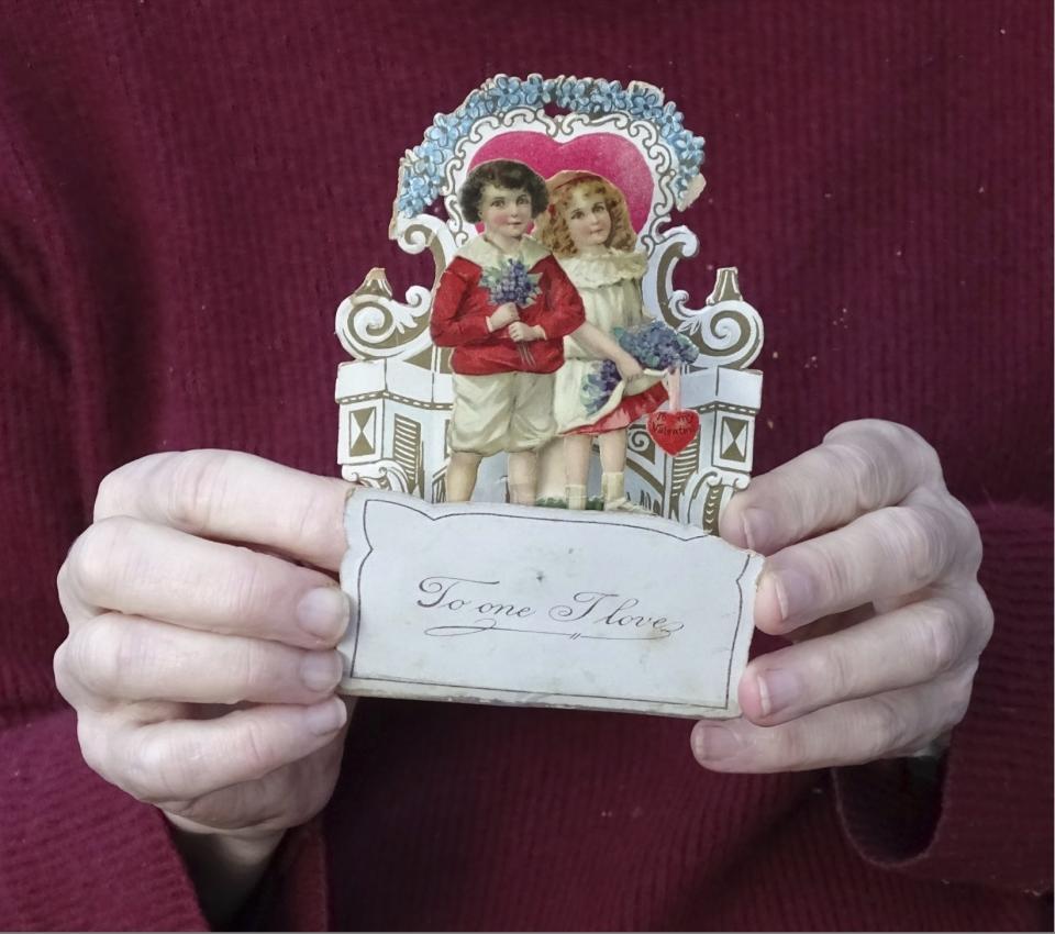 This image shows a Valentine’s Day card from 1917, given to Louise Wirt by Fred Roth when he was in the fourth grade. The couple married years later and the card remained near Louise's bedside until her death at 91. (Nancy Roth via AP)