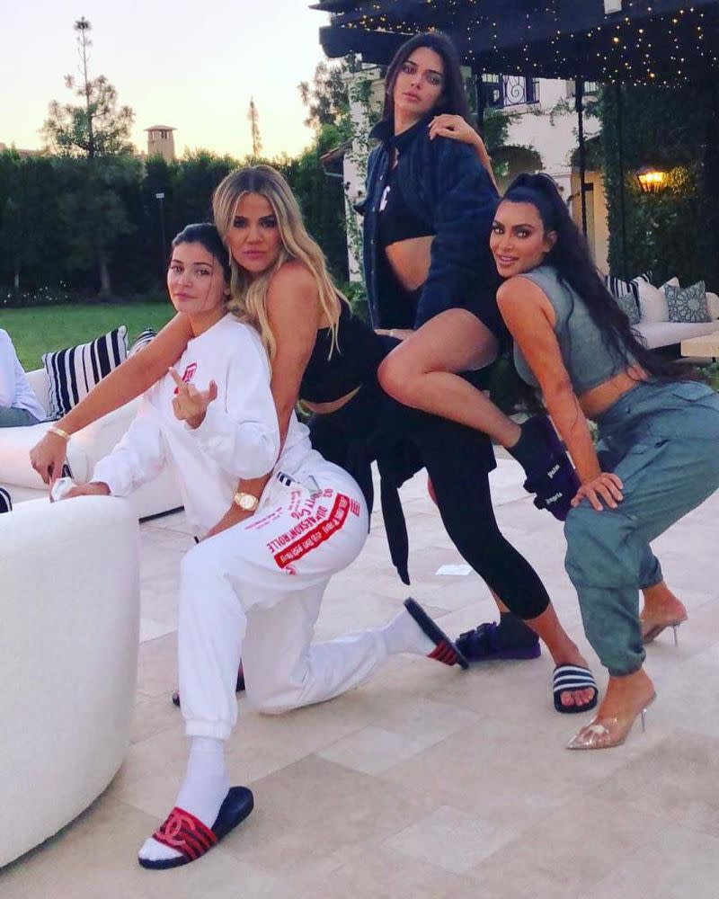 Khloé Kardashian with sisters Kylie Jenner, Kendall Jenner and Kim Kardashian Wes