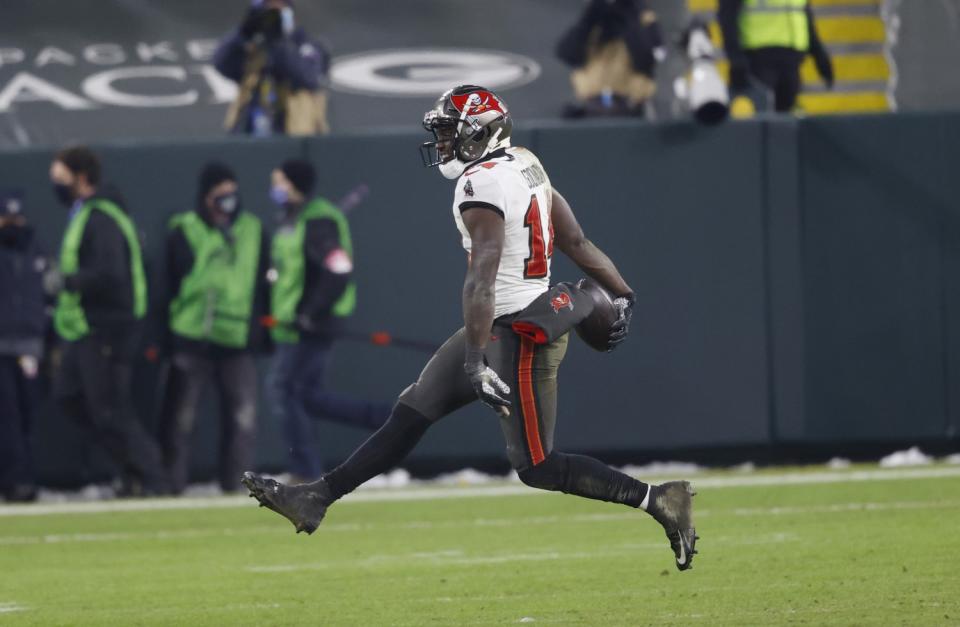 Tampa Bay Buccaneers wide receiver Chris Godwin (14) reacts after NFC championship win over the Green Bay Packers.