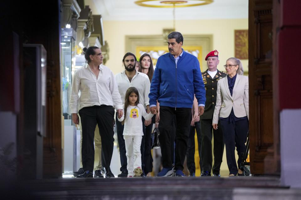 Venezuelan President Maduro and Alex Saab, left, walk out the Miraflores presidential palace after a meeting in Caracas, Venezuela, Wednesday, Dec. 20, 2023. The United States freed Saab, who was arrested on a U.S. warrant for money laundering in 2020, in exchange for the release of 10 Americans imprisoned in Venezuela, the Biden administration announced Wednesday. | Matias Delacroix, Associated Press