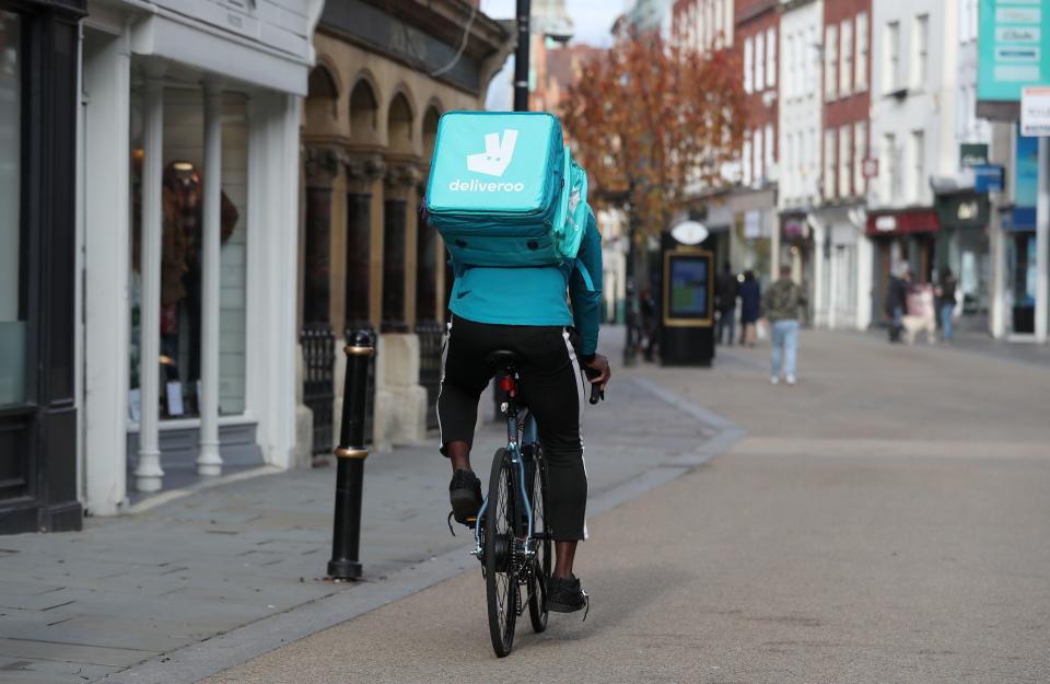 A Deliveroo rider (PA Wire)