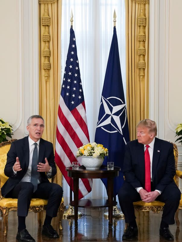 FILE PHOTO: U.S. President Trump meets with NATO Secretary General Stoltenberg, ahead of the NATO summit, in London