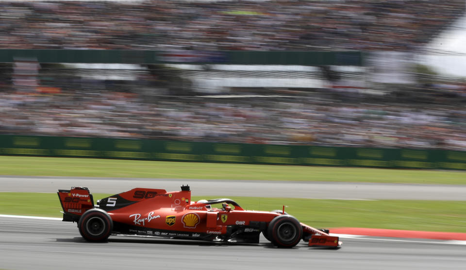 Ferrari driver Sebastian Vettel of Germany steers his car during the British Formula One Grand Prix at the Silverstone racetrack, Silverstone, England, Sunday, July 14, 2019. (AP Photo/Luca Bruno)