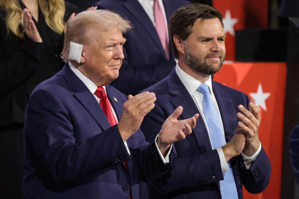  Republican presidential candidate, former President Donald Trump, and his running mate, U.S. Sen. J.D. Vance (R-OH), appear on the first day of the Republican National Convention at the Fiserv Forum on July 15, 2024 in Milwaukee, Wisconsin. (Photo by Scott Olson/Getty Images)
