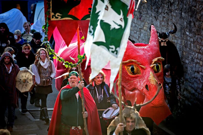 The Glastonbury Dragons are paraded through the town as they celebrate Samhain at the Glastonbury Dragons Samhain Wild Hunt