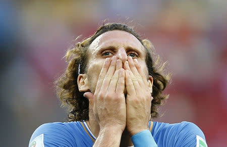 Uruguay's Diego Forlan reacts when the half time whistle is blown during the 2014 World Cup Group D soccer match between Uruguay and Costa Rica at the Castelao stadium in Fortaleza June 14, 2014. REUTERS/Dominic Ebenbichler