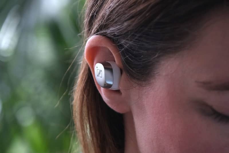 Sennheiser's earbuds tend to stick out of the side of your head quite prominently. If you think that's big, wait until you see the charging case. Coman Hamilton/dpa