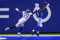 Indianapolis Colts wide receiver T.Y. Hilton (13) makes a catch for a touchdown in front of Tennessee Titans cornerback Breon Borders (39) in the second half of an NFL football game in Indianapolis, Sunday, Nov. 29, 2020. (AP Photo/AJ Mast)