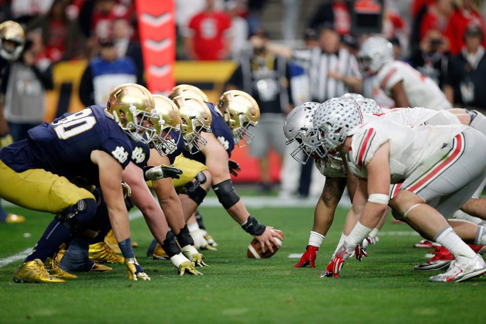 Notre Dame Fighting Irish offensive takes on the Ohio State Buckeyes defense in the third quarter during the Fiesta Bowl in the University of Phoenix Stadium on January 1, 2016.  (Dispatch photo by Kyle Robertson)  