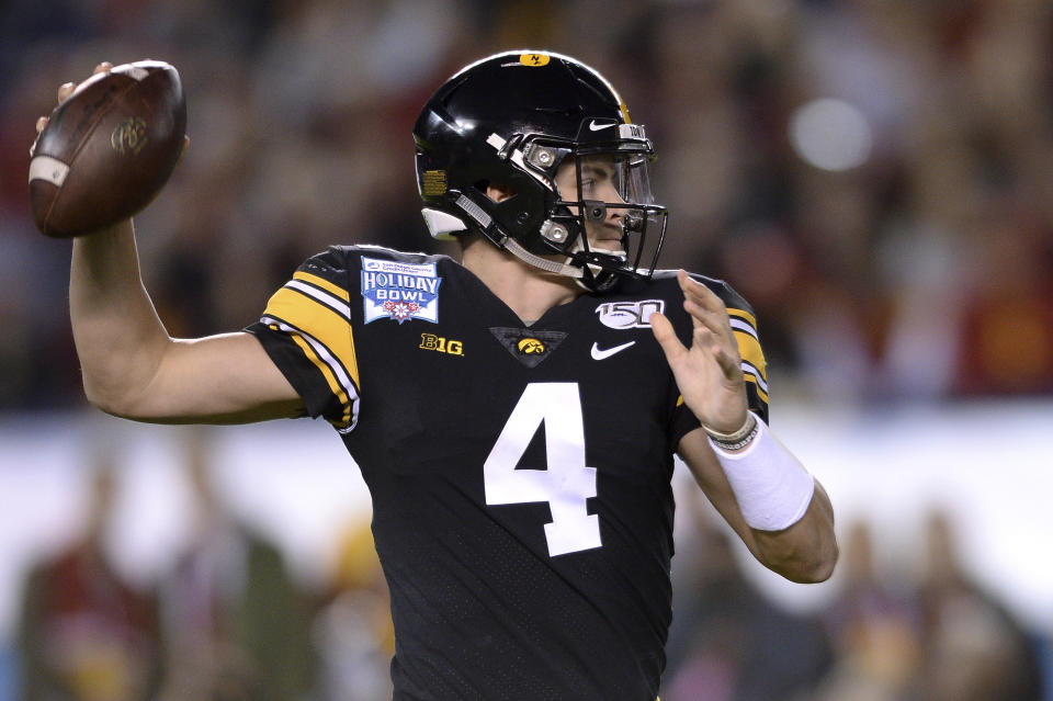 Iowa quarterback Nate Stanley looks to throw a pass during the first half of the Holiday Bowl NCAA college football game against Southern California, Friday, Dec. 27, 2019, in San Diego. (AP Photo/Orlando Ramirez)