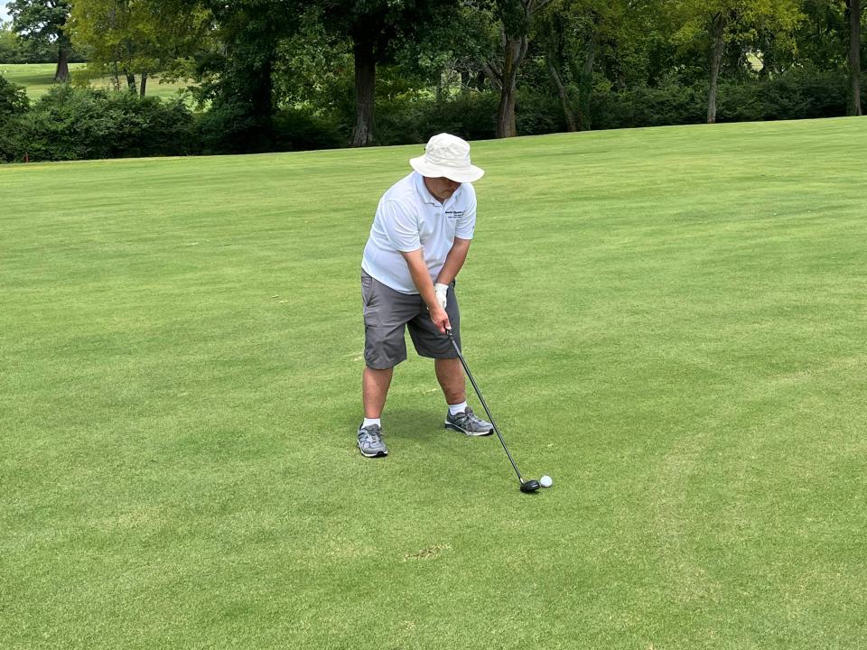Matthew Drumright prepares to take a swing during a game of Unified 9-Hole Golf during the Special Olympics Tennessee Golf Regional at Old Fort Golf Club in Murfreesboro on Monday, Aug. 15, 2022.