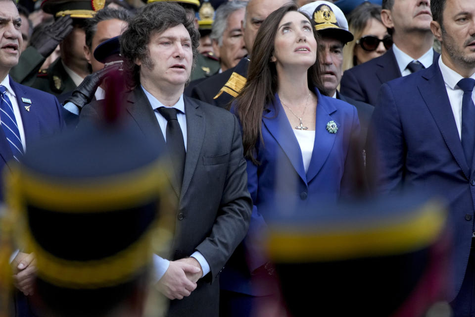 Argentine President Javier Milei, left, and his Vice President Victoria Villarruel attend the official ceremony commemorating the 42nd anniversary of the conflict between Argentina and Great Britain over the Falkland Islands or Malvinas Islands at a war memorial in Buenos Aires, Argentina, Tuesday, April 2, 2024. (AP Photo/Natacha Pisarenko)