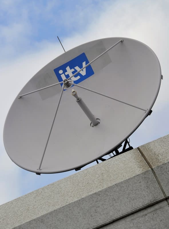 A satellite dish is seen on the roof of ITV television studios in central London August 3, 2010. ITV, REUTERS/Toby Melville