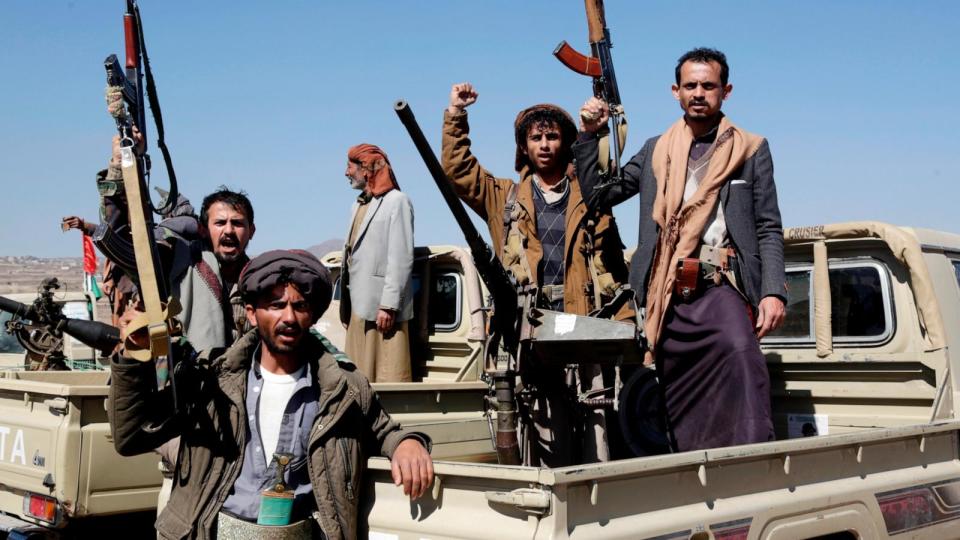 PHOTO: Houthi followers lift their rifles during a tribal gathering, Jan. 14, 2024, on the outskirts of Sana'a, Yemen.  (Mohammed Hamoud/Getty Images)