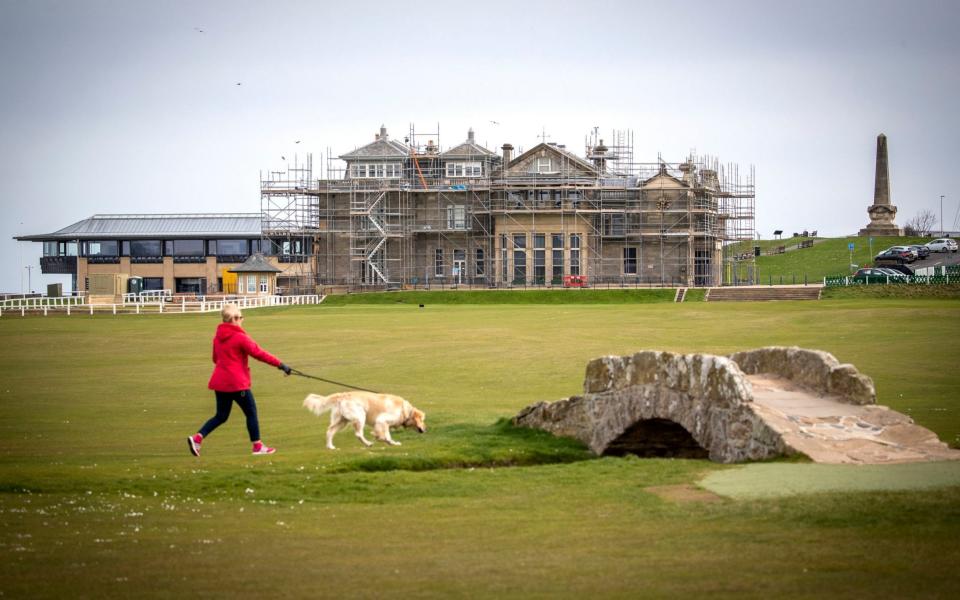 In Scotland, people have been able to walk their dogs on golf courses - but not to tee off - Jane Barlow/PA