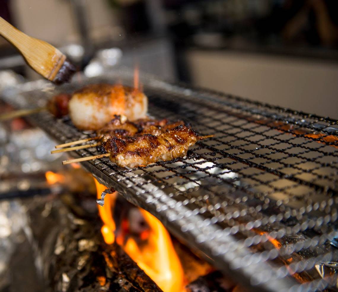 Grilled meat sits on the special Japanese grill known as Sumiyaki, which is imported from Japan at Japanese Izakaya restaurant Binchoyaki.