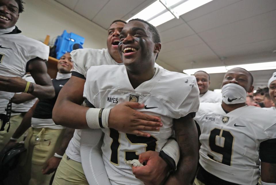 Army freshman defensive back Jayden Mayes (15) is celebrated for his key interception. DANNY WILD/USA TODAY Sports