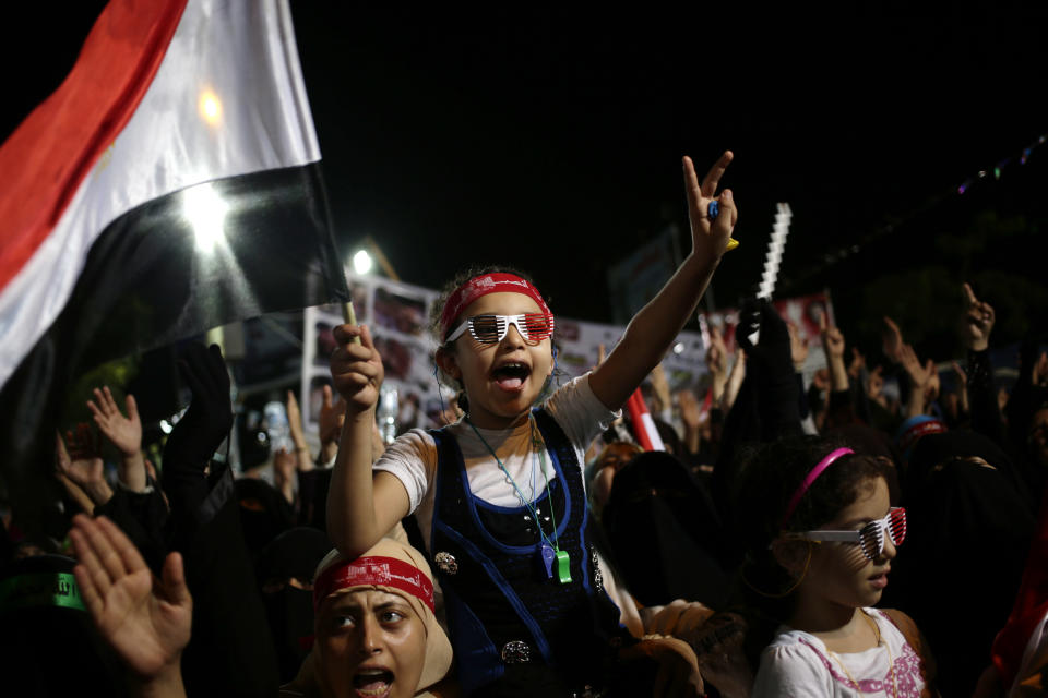 Supporters of Egypt's ousted President Mohammed Morsi chant slogans against Egyptian Defense Minister Gen. Abdel-Fattah el-Sissi at Rabaah al-Adawiya mosque, where supporters of Egypt's ousted President Mohammed Morsi have installed a camp and hold daily rallies at Nasr City, in Cairo, Egypt, Thursday, Aug. 1, 2013. (AP Photo/Hassan Ammar)