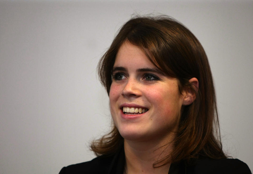 LEEDS, UNITED KINGDOM - OCTOBER 23:  Princess Eugenie listens to her mother Sarah Ferguson, Duchess of York  give a speech during a visit to the new Teenage Cancer Unit at St James' Hospital on October 23, 2008 in Leeds, England. The Duchess has been Patron of The Teenage Cancer Trust since its inception 15 years ago. During the visit she introduced her daughter Eugenie to the work of the Trust enabling her to see first hand how important these units are. The nine bed centre is the Teenage Cancer Trust's ninth unit in the UK and cost the charity GBP1.25 million.  (Photo by Christopher Furlong/Getty Images)