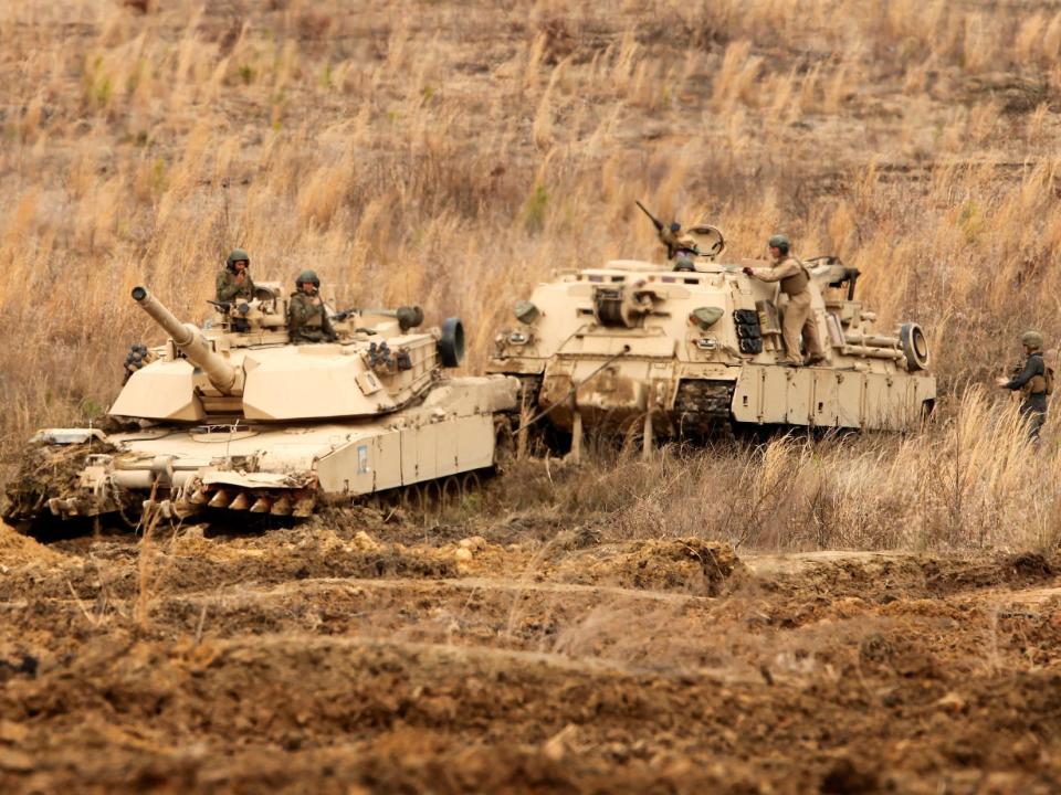 M88A2 pulls Marine Corps M1A1 Abrams tank out of ditch