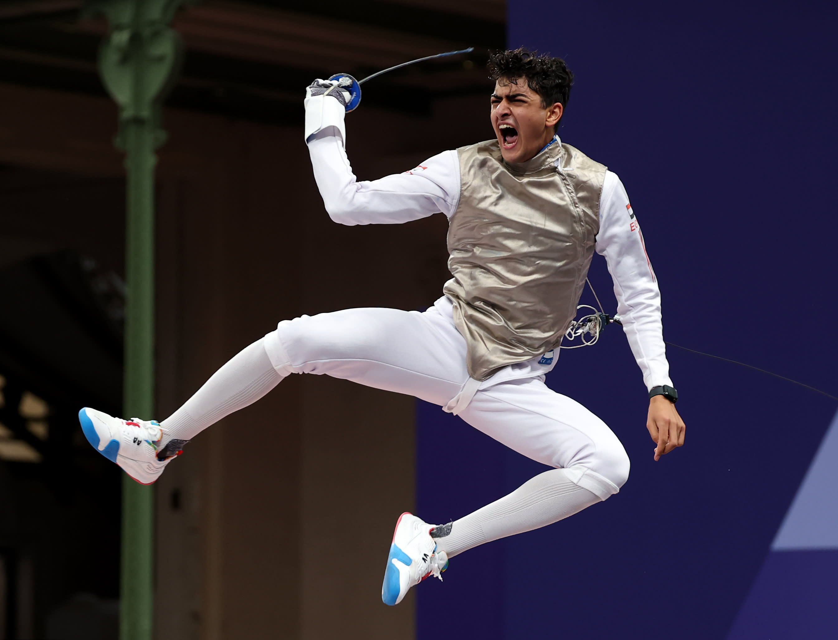 PARIS, FRANCE - JULY 29: Abdelrahman Hussein Tolba of Team Egypt celebrates his victory against Daniel Dosa of Team Hungary (not pictured) in the Fencing Men's Foil Individual Table of 32 on day three of the Olympic Games Paris 2024 at Grand Palais on July 29, 2024 in Paris, France. (Photo by Al Bello/Getty Images)